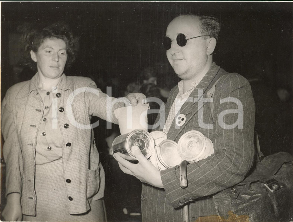1953 EAST BERLIN Rush on food distribution - War-blind getting his ration *Photo