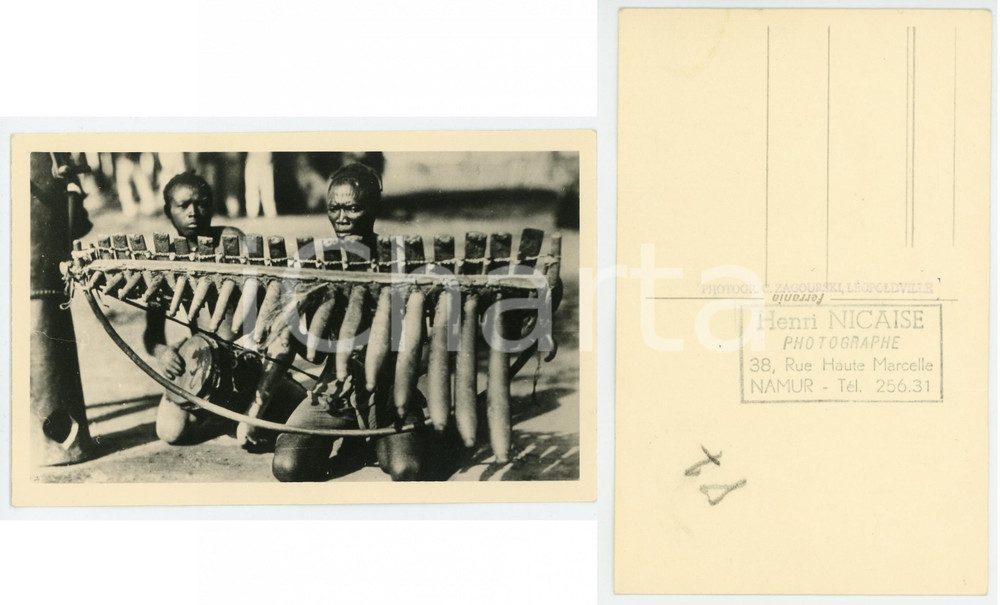 1930 C. ZAGOURSKI «L'Afrique qui disparaît»  CONGO BELGE Xylophone *Postcard 134  Fotocartolina postale d'epoca, appartenente alla 1^serie &laquo;L'Afrique qui dispara&icirc;t&raquo; del fotografo Casimir Zagourski (L&eacute;opoldville).N&deg;134, non viaggiata.Timbro ulteriore al verso del fotografo Henri Nicaise - Namur.CONDIZIONI: G FORMATO: 14x9 cm    originale e autentica 1