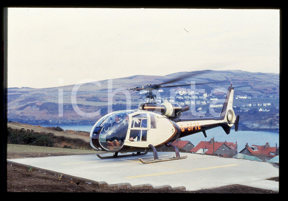 35mm vintage slide* 1990 ca COSTUME Nigel MANSELL pilota di elicottero