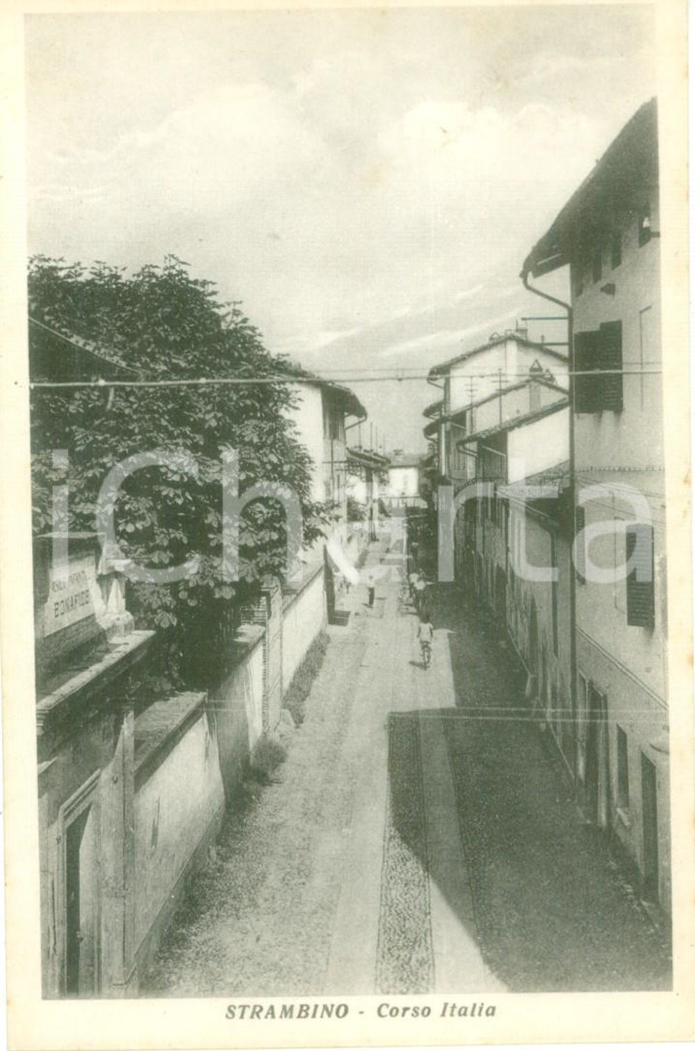 Cartolina originale da collezione 1940 ca STRAMBINO (TO) Biciclette in Corso Italia *Cartolina postale FP NV 1