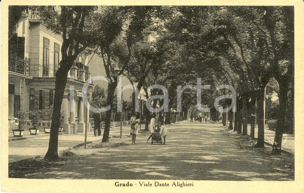 Cartolina originale da collezione 1951 GRADO (GO) Scorcio di via DANTE ALIGHIERI *Cartolina ANIMATA FP VG 1
