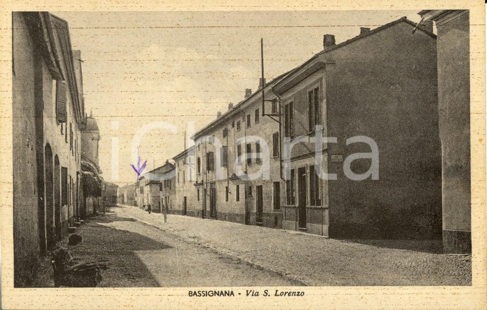 Cartolina originale da collezione 1943 BASSIGNANA AL Scorcio di Via San Lorenzo Cartolina ANIMATA FP NV 1