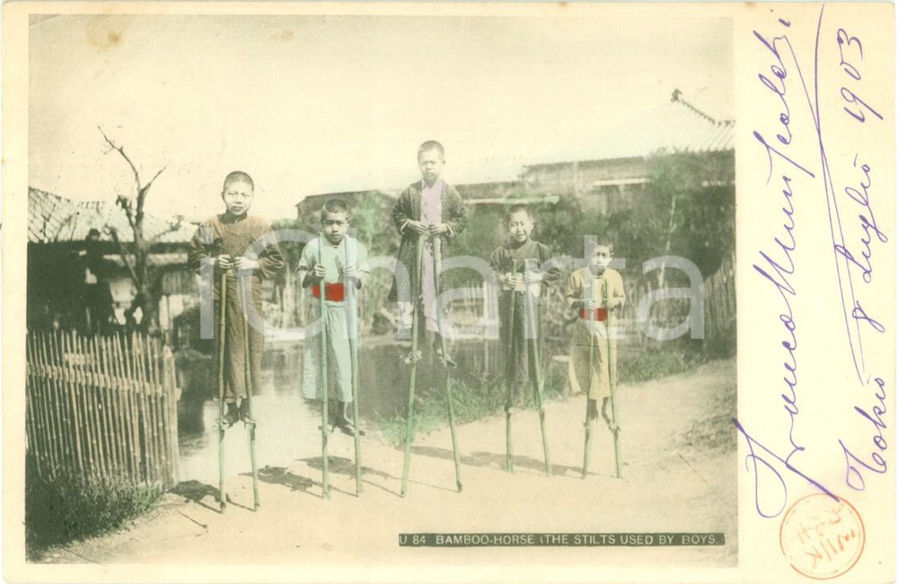 Cartolina originale da collezione 1903 TOKYO JAPAN Bambini giapponesi sui trampoli di bambÃ¹ Cartolina FP VG 1