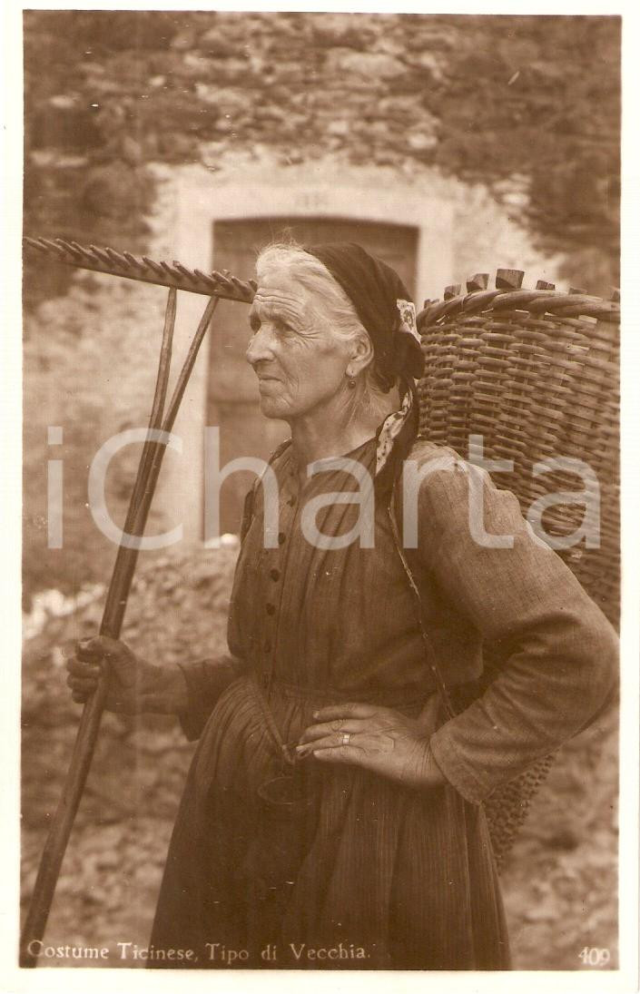 Cartolina originale da collezione 1935 ca CANTON TICINO SVIZZERA Anziana con gerla e rastrello Cartolina FG NV 1