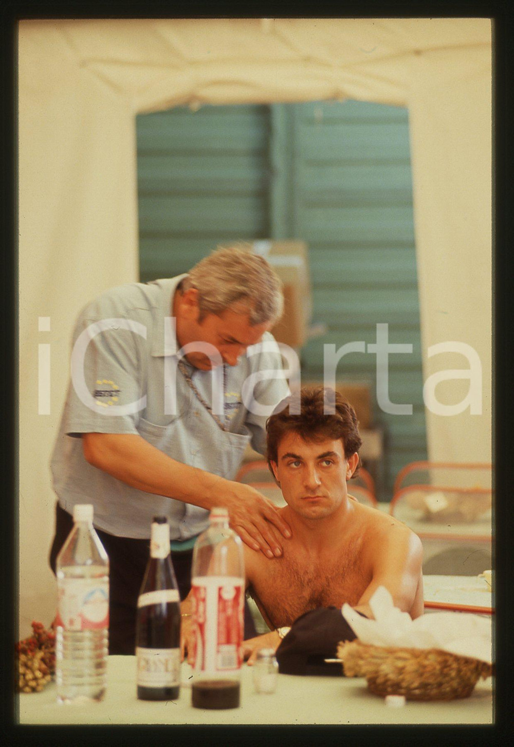 35mm vintage slide* 1990 ca F1 Jean ALESI massaggiato da funzionario STET 11
