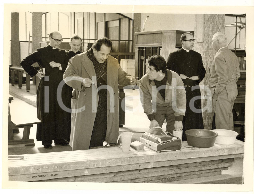 1962 HAYES Pietro ANNIGONI supervising the hanging of his "Madonna with Child"