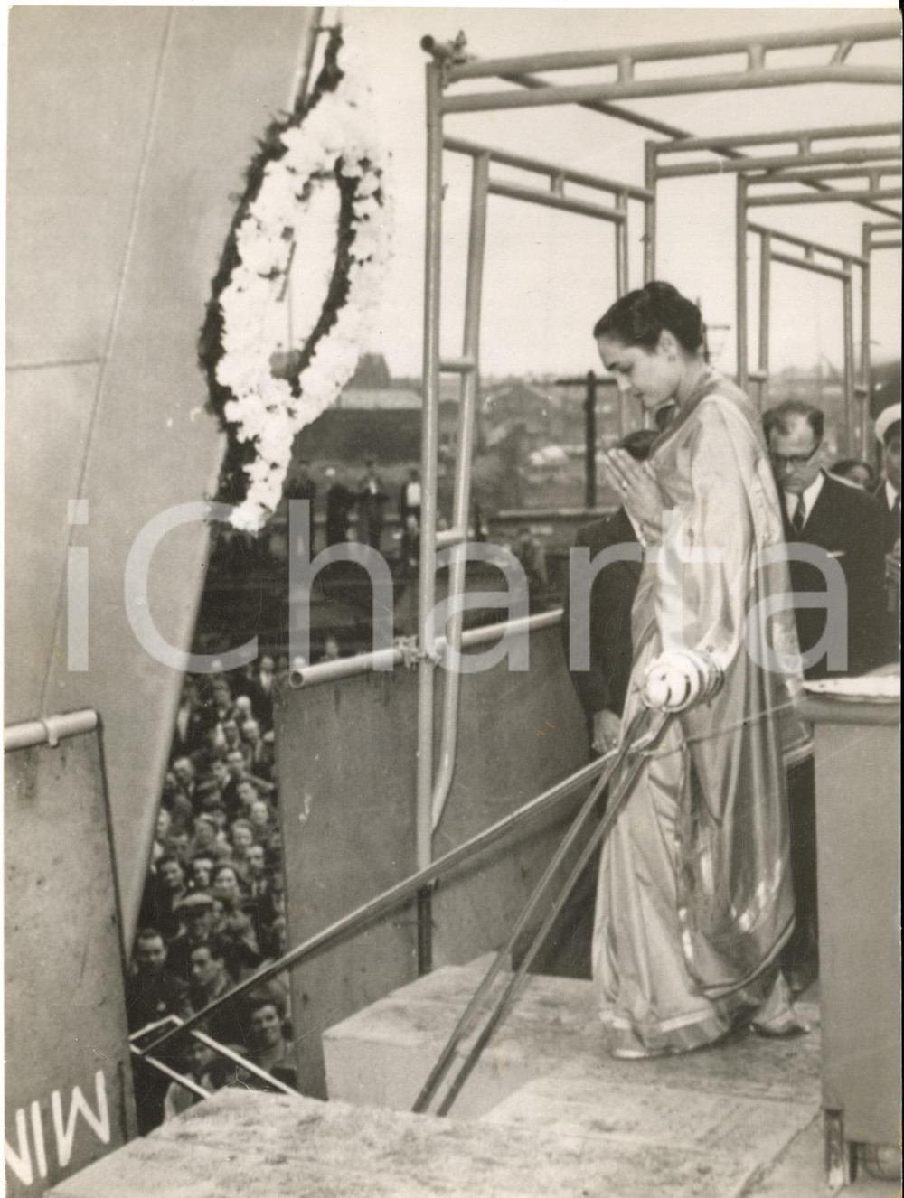 1958 GLASGOW Beryl SHIRARI prays to Varuna before she launches frigate KIRPAN
