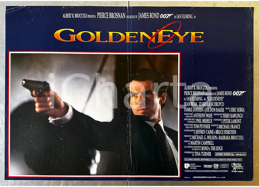 1995 JAMES BOND: GOLDENEYE 007 Pierce BROSNAN Martin CAMPBELL Lobby card Lobby card d'epoca, originale e autentica.   CONDIZIONI:POOR/danneggiato piegatura centrale, piegature e lievi strappi ai marginiFORMATO: 66x46 cm originale e autentica 1