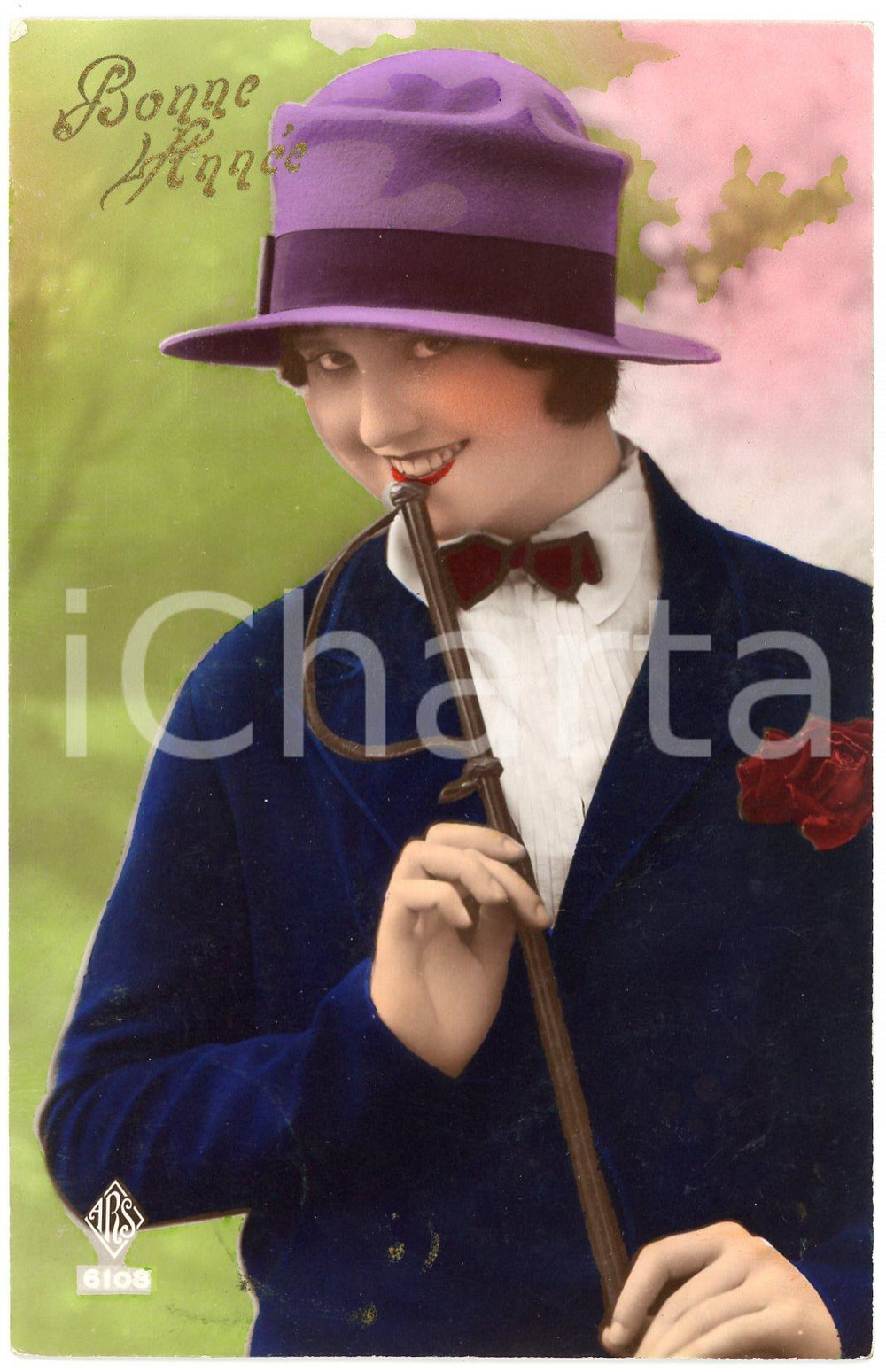 1930 BONNE ANNEE Elegant woman with bow tie and whip - Embossed vintage postcard  Cartolina postale d'epoca, viaggiata (ma francobollo asportato).CONDIZIONI: G (minima smussatura angolare)FORMATO: FP    originale e autentica 1