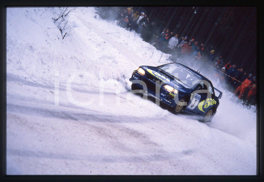 SUBARU IMPREZA S5 WRC '97 - WRC SWEDISH RALLY 1998 35 mm vintage slide 5 Diapositiva d'epoca, in formato 35 mm.CONDIZIONI: GOODE' severamente vietata la riproduzione. Tutti i diritti sono riservati.Nella diapositiva ICharta mette in vendita, sul negozio eBay e in esclusiva sul sito "icharta" il proprio archivio composto da numerose diapositive e negativi fotografici d'epoca, tutti originali e autentici, che attraversano la storia del costume italiano tra gli la fine degli anni Sessanta e Novanta.Si tratta di uno sguardo inedito sull'attualità , la politica, la vita quotidiana, il gossip e la cultura, che fotografa il cambiamento della nazione in quest'ultimo scorcio del XX secolo. Un'occasione unica per il mercato del collezionismo, che vede finalmente disponibile un archivio eccezionale per vastità , tematiche e condizioni, in un settore (il negativo fotografico e la diapositiva) di assoluta novità  e dalle interessanti prospettive di investimento.  GOOD/buono   originale e autentica 1
