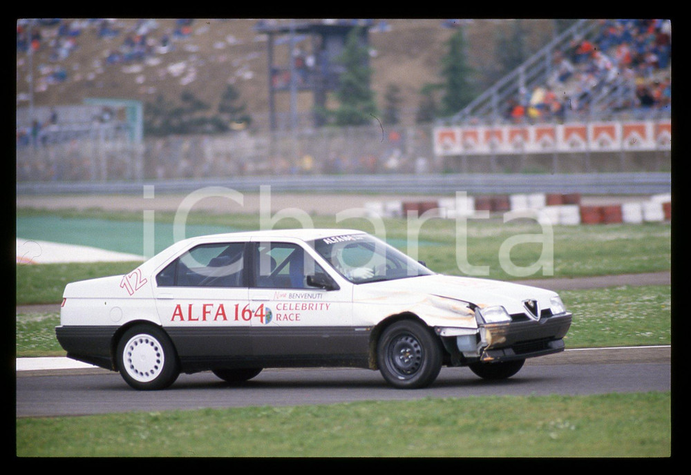 Nino BENVENUTI ALFA 164 CELEBRITY RACE SAN MARINO GP 1988 35 mm vintage slide 2 Diapositiva d'epoca, in formato 35 mm.CONDIZIONI: GOODE' severamente vietata la riproduzione. Tutti i diritti sono riservati.Nella diapositiva ICharta mette in vendita, sul negozio eBay e in esclusiva sul sito "icharta" il proprio archivio composto da numerose diapositive e negativi fotografici d'epoca, tutti originali e autentici, che attraversano la storia del costume italiano tra gli la fine degli anni Sessanta e Novanta.Si tratta di uno sguardo inedito sull'attualità , la politica, la vita quotidiana, il gossip e la cultura, che fotografa il cambiamento della nazione in quest'ultimo scorcio del XX secolo. Un'occasione unica per il mercato del collezionismo, che vede finalmente disponibile un archivio eccezionale per vastità , tematiche e condizioni, in un settore (il negativo fotografico e la diapositiva) di assoluta novità  e dalle interessanti prospettive di investimento.  GOOD/buono   originale e autentica 1