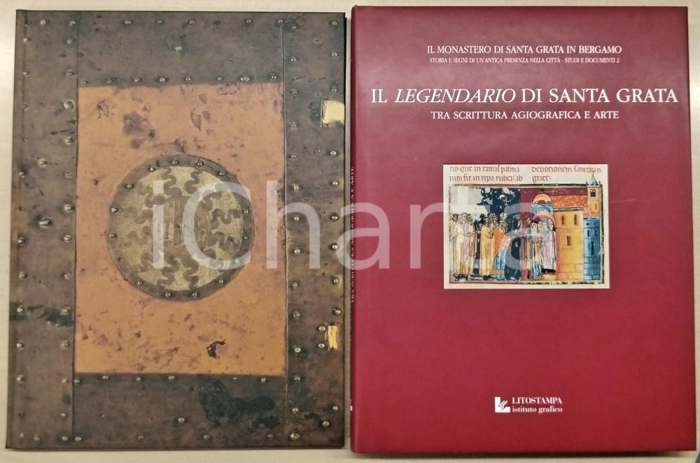 2002 BERGAMO - LEGENDARIO DI SANTA GRATA Ist. Grafico Litostampa - 2 Voll. (2) Cofanetto contente due volumi.Il primo in brossura editoriale con copertina rigida è una riproduzione in fac-simile della "Vita sancte grate". Il secondo in brossura editoriale con copertina rigida telata e sovraccoperta è intitolato "Il legendario di Santa Grata - Tra scrittura agiografica e arte". COLLANA: Il Monastero di Santa Rita in Bergamo - Storia e segni di un'autentica presenza nella cittàStudi e documenti 2EDITORE: Istituto Grafico LitostampaPAGINE: 56 + 195  GOOD/buono Abrasione al dorso del cofanetto Formato: 26x35 cm originale e autentica 1