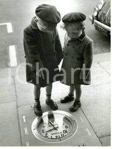 1954 WINDSOR Graham and David WOOLRIDGE admiring a clock in the floor *Photo