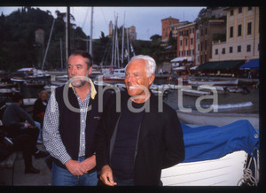Giorgio ARMANI - MODA Stilista PORTOFINO 1995 ca * 35 mm vintage slide 2  Diapositiva d'epoca, in formato 35 mm.CONDIZIONI: GOODE' severamente vietata la riproduzione. Tutti i diritti sono riservati.Nella diapositiva ICharta mette in vendita, sul negozio eBay e in esclusiva sul sito "icharta" il proprio archivio composto da numerose diapositive e negativi fotografici d'epoca, tutti originali e autentici, che attraversano la storia del costume italiano tra gli la fine degli anni Sessanta e Novanta.Si tratta di uno sguardo inedito sull'attualit&agrave;, la politica, la vita quotidiana, il gossip e la cultura, che fotografa il cambiamento della nazione in quest'ultimo scorcio del XX secolo. Un'occasione unica per il mercato del collezionismo, che vede finalmente disponibile un archivio eccezionale per vastit&agrave;, tematiche e condizioni, in un settore (il negativo fotografico e la diapositiva) di assoluta novit&agrave; e dalle interessanti prospettive di investimento.  GOOD/buono   originale e autentica 1