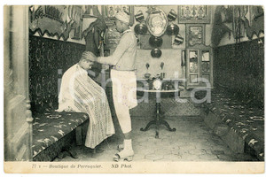 1910 ca TUNISIE METIERS Boutique de perruquier - French vintage postcard  Cartolina postale d'epoca, non viaggiata. FAIR/discreto sovraimpressione del timbro al recto Formato: 14x9 cm originale e autentica 1