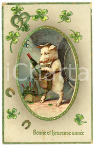 1910 BONNE ET HEUREUSE ANNÉE Lucky pig with a bottle of wine *Embossed postcard  Cartolina postale d'epoca, viaggiata, in rilievo.CONDIZIONI: VP (strappo centrale alla pellicola e abrasioni angolari; macchie al verso)FORMATO: FP    originale e autentica 1