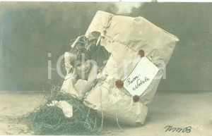 Cartolina originale da collezione 1907 BUON NATALE Bambino esce da un pacco regalo Cartolina FP VG 1