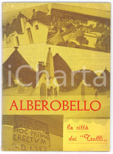 1961 Oronzo SISTO Gino ANGIULLI Alberobello, la cittÃ  dei trulli - Pubblicazione Pubblicazione illustrata d'epoca, con mappa.EDITORE: Offiche grafiche De Robertis - PutignanoPAGINE: 31  FAIR/discreto Lievi abrasioni al dorso, e piccolo strappo al margine inferiore della copertina Formato: 16x22 cm originale e autentica 1