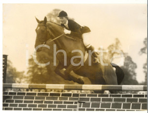 1957 BADMINTON Horse Trials - Sheila WILLCOX on HIGH AND MIGHTY jumping a fence