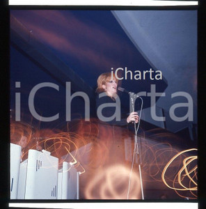 6X6cm NEGATIVO ORIGINALE *1975 circa MINA in concerto autentico VINTAGE**   Negativo originale a colori, in formato cm 6 x 6 CONDIZIONI: GOOD E' SEVERAMENTE VIETATA LA RIPRODUZIONE.TUTTI I DIRITTI SONO RISERVATI.ICharta mette in vendita, sul negozio eBay e in esclusiva sul sito "icharta" il proprio archivio composto da numerose diapositive e negativi fotografici d'epoca, tutti originali e autentici, che attraversano la storia del costume italiano tra gli la fine degli anni Sessanta e Novanta.Si tratta di uno sguardo inedito sull'attualit&agrave;, la politica, la vita quotidiana, il gossip e la cultura, che fotografa il cambiamento della nazione in quest'ultimo scorcio del XX secolo. Un'occasione unica per il mercato del collezionismo, che vede finalmente disponibile un archivio eccezionale per vastit&agrave;, tematiche e condizioni, in un settore (il negativo fotografico e la diapositiva) di assoluta novit&agrave; e dalle interessanti prospettive di investimento.  originale e autentica 1