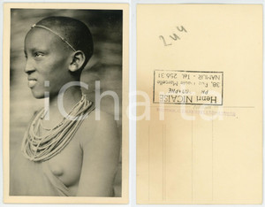 1930 ca C. ZAGOURSKI «L'Afrique qui disparaît»  KENIA - Femme MASAI *Postcard  Fotocartolina postale d'epoca, appartenente alla serie &laquo;L'Afrique qui dispara&icirc;t&raquo; del fotografo Casimir Zagourski (L&eacute;opoldville).Serie II n&deg; 154, non viaggiata.Timbro ulteriore del fotografo Henri Nicaise - Namur.CONDIZIONI: G FORMATO:  9x14 cm    originale e autentica 1
