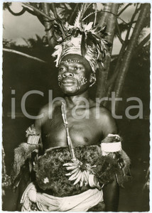1950 ca A TRAVERS LE CONGO Guerrisseur Muhombo - Carte postale FG NV  Cartolina postale d'epoca, non viaggiata.FOTOGRAFO: CongopresseEDIZIONI: Editions Film Photo Cine, Leopoldville CONDIZIONI: FAIRFORMATO: FG    originale e autentica 1