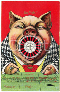 1910 ca. Un Plein - Pig with a roulette in its mouth *Anthropomorphic postcard  Cartolina postale d'epoca, non viaggiata.CONDIZIONI: F (lievi abrasioni angolari)FORMATO: FP    originale e autentica 1