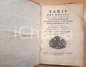 1770 REGNO DI SARDEGNA Tarif des droits dus aux finances à la grande chancelerie Legatura coeva con copertina cartonata rigida rivestita in pergamena. Titolo manoscritto al dorso.Titolo completo: "Tarif des droits dus aux finances à la Grande Chancellerie aux bureaux d'Etat, et des guerres pour les provisions de S.M.; de ceux dus aux magistrats, officiers de justice et autres à differens égards".EDITORE: Torino - Imprimerie RoyalePAGINE: 420 CONDIZIONI:FAIR/discreto buone condizioni interne, piegatura al frontespizio e alla copertaFORMATO: 19x26 cm originale e autentica 1