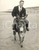1956 WESTON-SUPER-MARE Boxer Gordon HAZELL relaxes with a beach ride on donkey