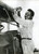 1957 LIVERPOOL Boxer Hogan BASSEY working at EEC transport department *Photo