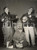 1953 MUNICH - UD lieutenants Jimmy BOARD and Eli ELIASEN sing to help a man