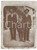 1915 ca ITALIA Ritratto di bambino con due uomini in cortile rurale - Foto  Fotografia d'epoca, in formato cartolina postale, con messaggio al verso per i nonni a Cornaletto Soprano (Demonte, Cuneo).Viaggiata. POOR/danneggiato macchie evidenti al lato inferiore, con minimo strappo Formato: 9x12 cm originale e autentica 1