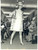 Fotografia d epoca originale 1965 ca PARIS MODA VINTAGE Modella sfila con abito bianco e trench fantasia 1