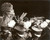 Fotografia d epoca originale 1970 ca USA  CINEMA Dancers carry showgirl on their shoulders Photo 25x20 cm 1