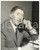 1954 EPSOM Major John WATTS on the phone *Photo 15x20 Fotografia d'epoca, con didascalia coeva al verso. CONDIZIONI: G (ma lieve piegatura al margine superiore; sovraimpressione al centro)FORMATO: 15x20 cm    originale e autentica 1