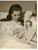 1954 ROMA Tania WEBER con il figlio neonato Rodolfo HECHT LUCARI - Foto 13x16 cm Fotografia d'epoca, con didascalia coeva al verso.CONDIZIONI: FAIR (lieve alone diffuso; alone diffuso)FORMATO: 13x16 cm    originale e autentica 1