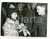 1953 LONDON Child prodigy Giannella DE MARCO receiving a bouquet on her arrival 