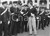 Fotografia d epoca originale 1957 GENOVA Rally del Cinema  Roberto RISSO saluta i carabinieri  Foto 24x18 1
