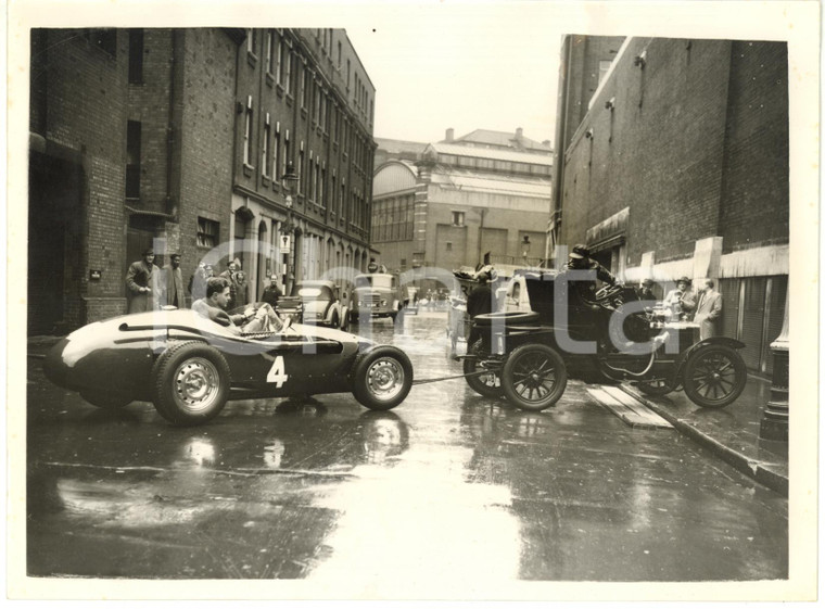 1956 LONDON - Veteran car GENEVIEVE tows a CONNAUGHT driven by Ron FLOCKHART 