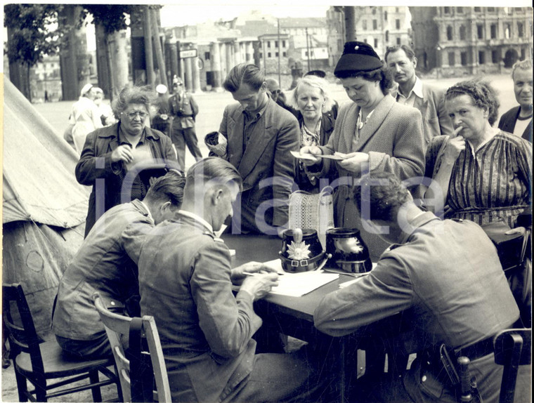 1953 WEST BERLIN Citizen from East sector at the borderline with policemen PHOTO