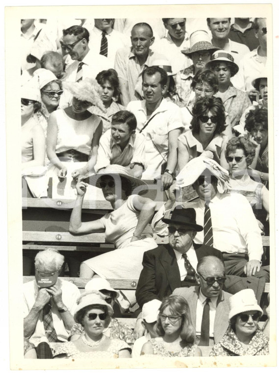 1961 LONDON WIMBLEDON A man totally dressed in black in the crowd under the sun