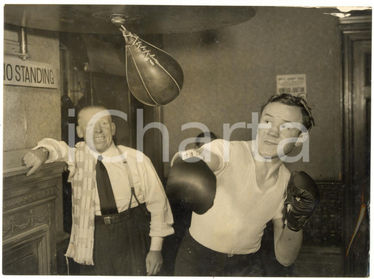 1955 LONDON Sammy McCARTHY on the punch ball with trainer Snowy BUCKINGHAM