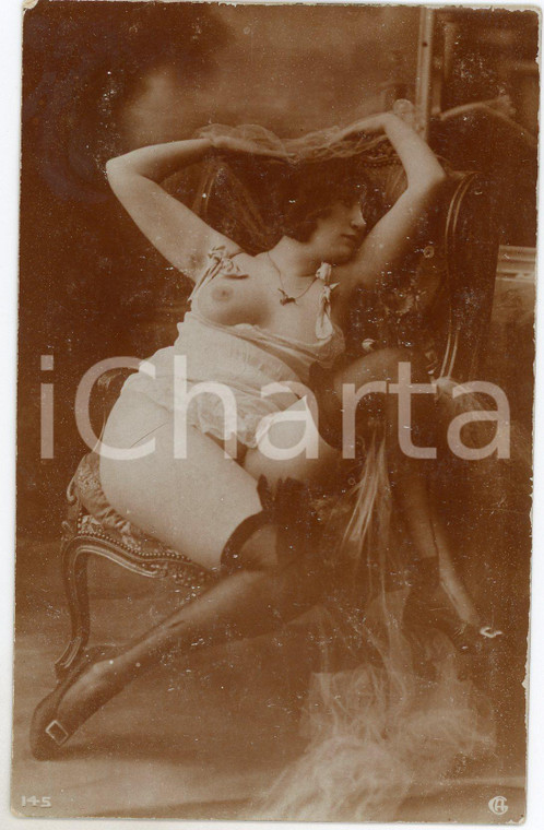 1910 ca VINTAGE EROTIC BOUDOIR Woman in stockings *Postcard risque DAMAGED