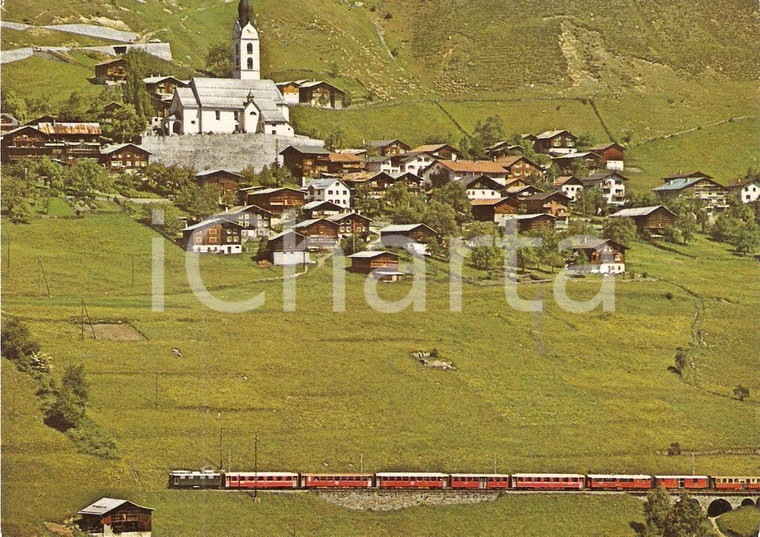 1975 ca SOMVIX (SVIZZERA) Rhätische Bahn RhB Treno attraversa paese *Cartolina