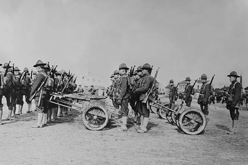 Detachment of a weapons Platoon of a Marine Machine Gun unit parades