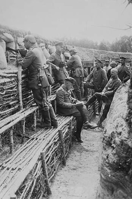 German Soldiers relax in their deep trenches which in the Stalemates of WWI have become a home.