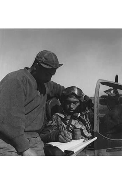 Pilot from the 332nd Fighter Group signing Form One Book
