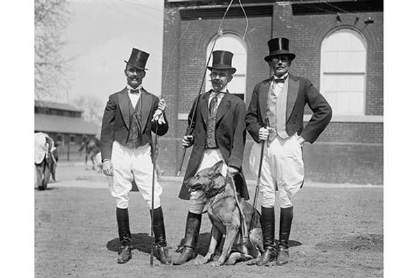 Society Men don costumes of Ringmasters for Circus