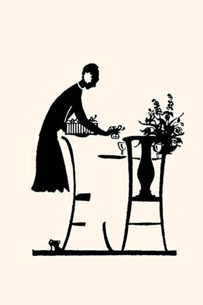 Homemaker fills a vase with flowers