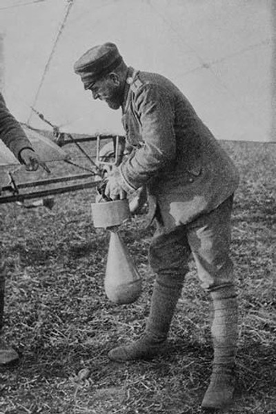 German Bomber Pilot attached a bomb to the strut of his airplane